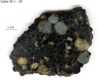 Fig. 1: A chondrite from Gujba. Most of the small roundish pieces are  chondrules. (Image adopted from J.   Bollard)