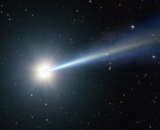 Blown away by Black Holes: Losing Planetary Atmospheres to Quasar Radiation