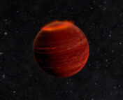 An artist's impression of a brown dwarf floating through space. The brown dwarf is red with subtle stripes, and it has a visible aurora at its northern pole.
