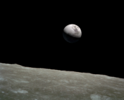 Modified image of Earth taken from the lunar surface, with Earth replaced by another Moon.