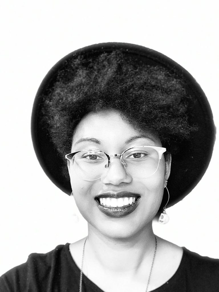 Profile picture of Bryné Hadnott, a Black female planetary scientist and science educator being featured in today's profile