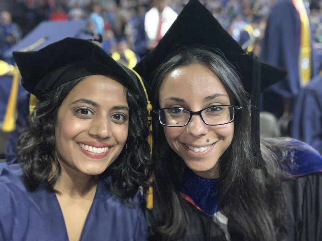 Dr. Patel and her graduate advisor, Dr. Besla, smiling at her graduation