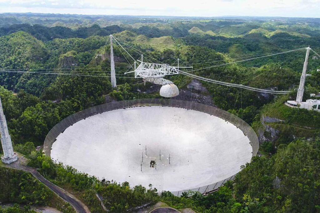 An aerial image of the large primary dish for Arecibo Observatory