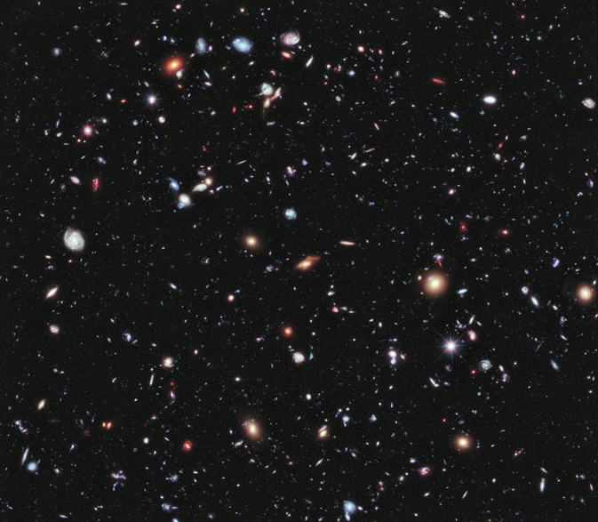 from NASA: Called the eXtreme Deep Field, or XDF, the photo was assembled by combining 10 years of NASA Hubble Space Telescope photographs taken of a patch of sky at the center of the original Hubble Ultra Deep Field. The XDF is a small fraction of the angular diameter of the full moon. The Hubble Ultra Deep Field is an image of a small area of space in the constellation Fornax, created using Hubble Space Telescope data from 2003 and 2004. By collecting faint light over many hours of observation, it revealed thousands of galaxies, both nearby and very distant, making it the deepest image of the universe ever taken at that time. The new full-color XDF image is even more sensitive, and contains about 5,500 galaxies even within its smaller field of view. The faintest galaxies are one ten-billionth the brightness of what the human eye can see.