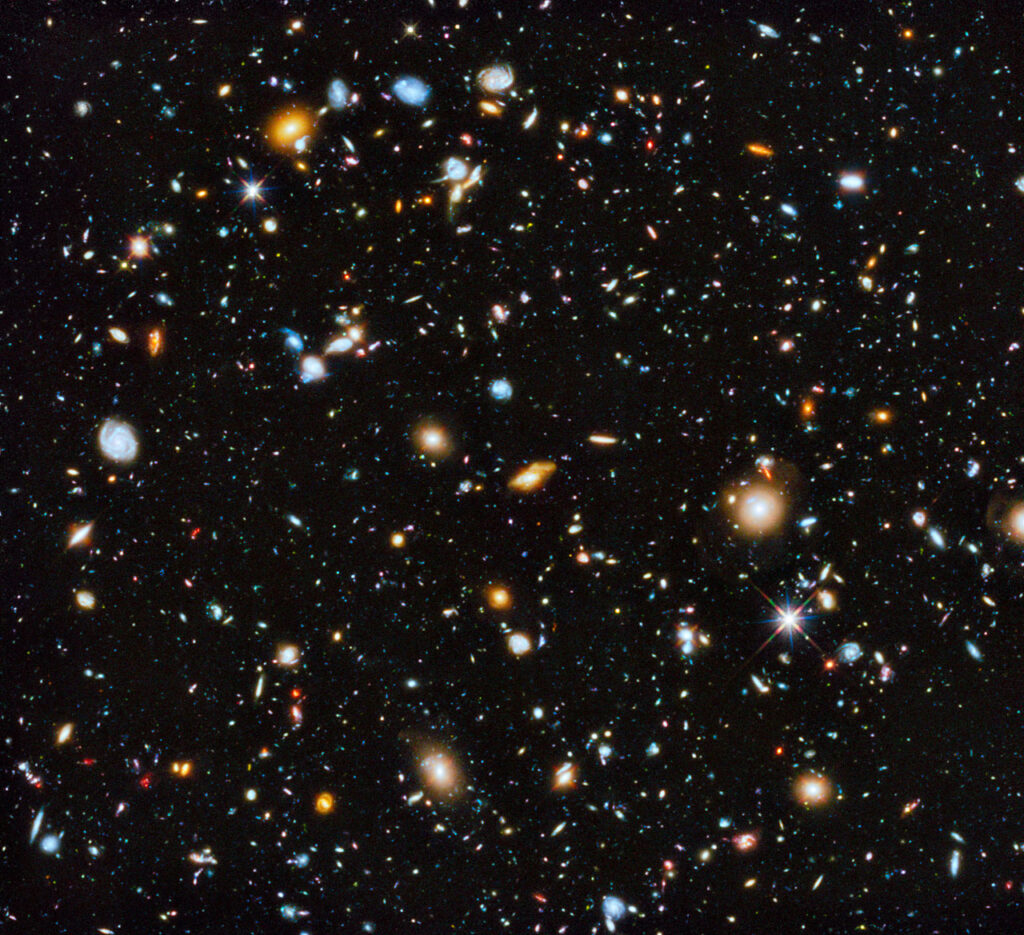 from ESA: Astronomers using the Hubble Space Telescope have captured the most comprehensive picture ever assembled of the evolving Universe — and one of the most colourful. The study is called the Ultraviolet Coverage of the Hubble Ultra Deep Field (UVUDF) project.