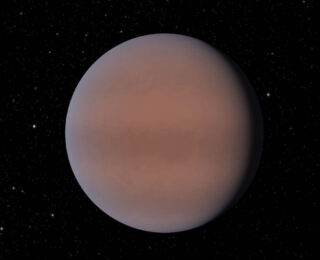 A Moist Exoplanet in the Neptune Desert