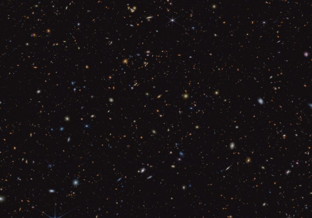 an enormous field of galaxies as seen in the infrared by JWST