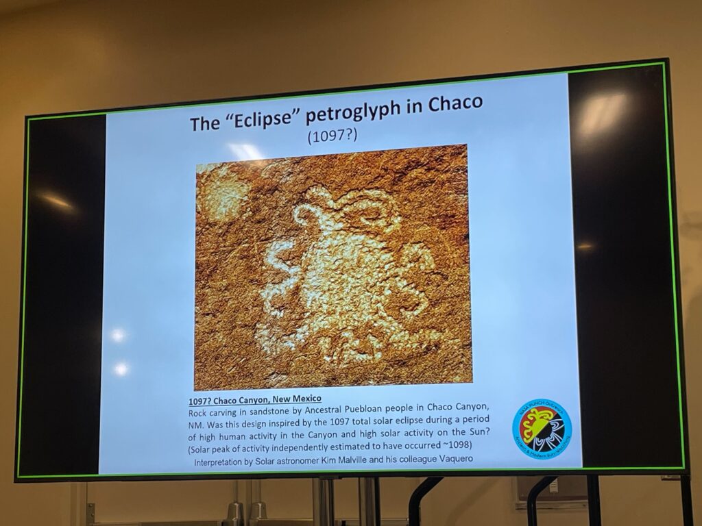 slide displaying a picture and description of the solar eclipse petroglyph in New Mexico