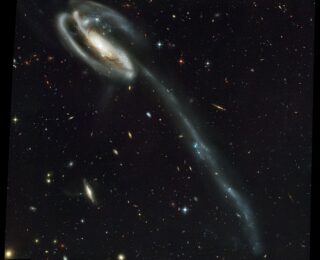 Galactic Tails tell Galactic Tales – and this one is a Strange Tail Indeed
