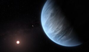 an artists impression of a blue, oceanic world orbiting a small red star amidst a dark space background
