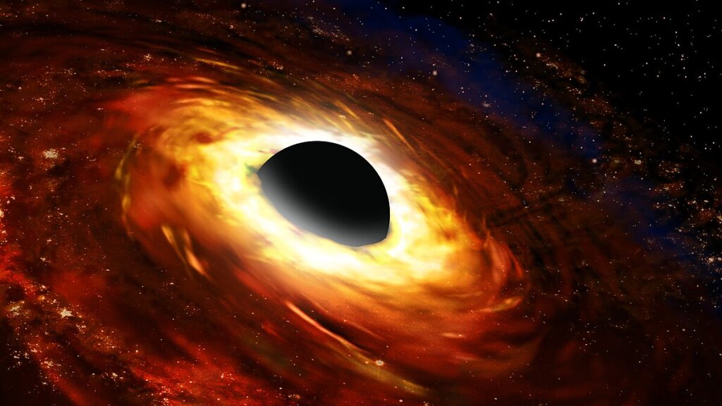 Supermassive black holes are found at the center of galaxies, chomping on gas and dust that gets pulled into their strong gravitational field. They are surrounded by a hot, swirling accretion disk of material.