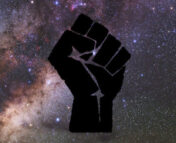 The logo of the Black in Astro organization, featuring a closed fist over the Milky Way Galaxy
