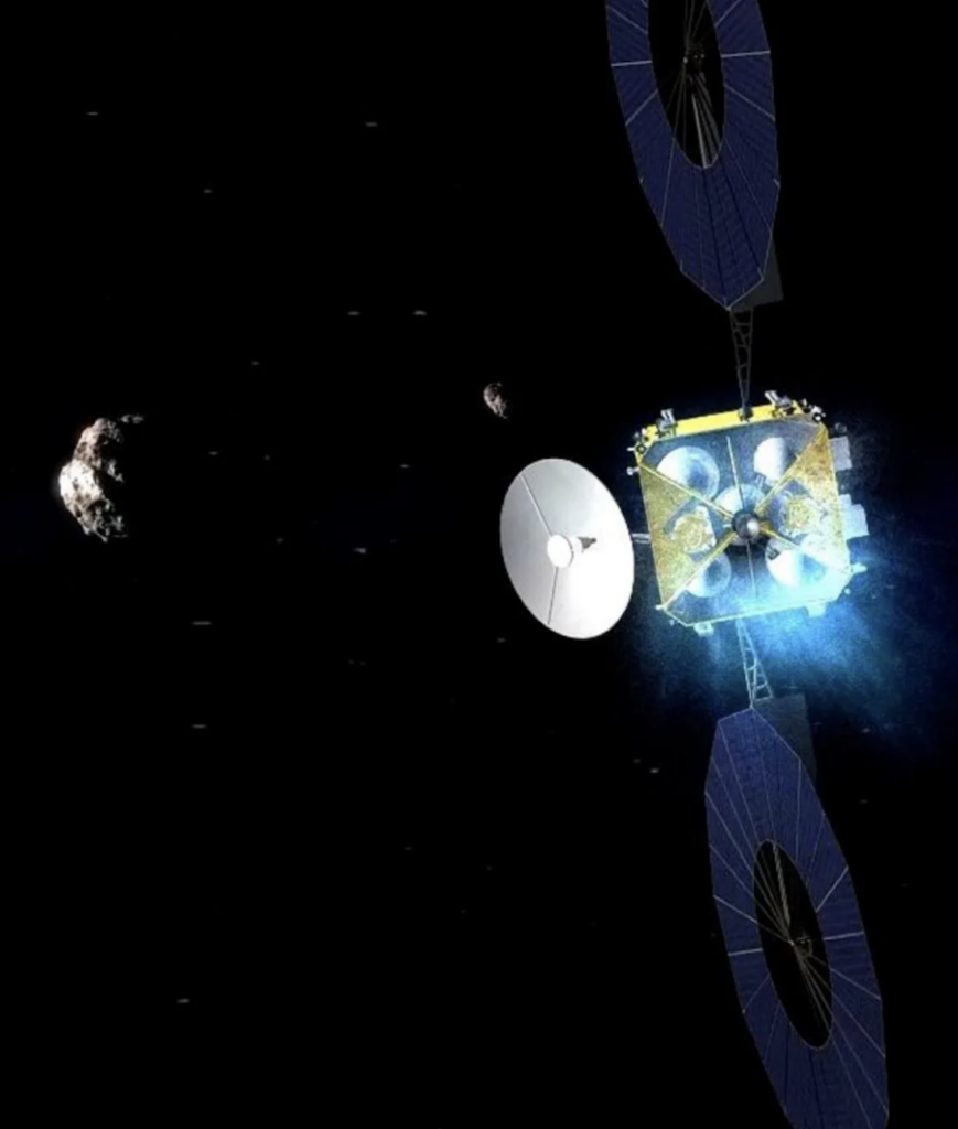 A bright spacecraft with solar panels opened out hovering near two rocky bodies-- potentially, an asteroid and a comet.
