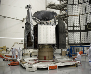 Probing Jupiter’s Atmosphere and Space Environment in Microwave Using Juno