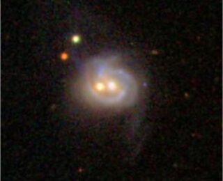 Duel of the Dual: The Mystery of a Quasar Pair