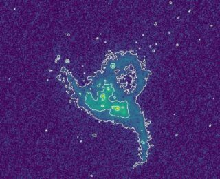 A Triple Black Hole System Caught in the Act of Self-Quenching