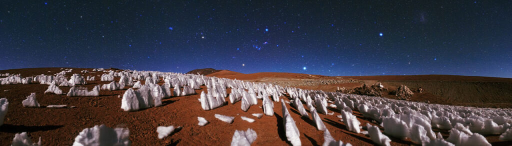 photograph of spiky ice structures called penitentes in a desert